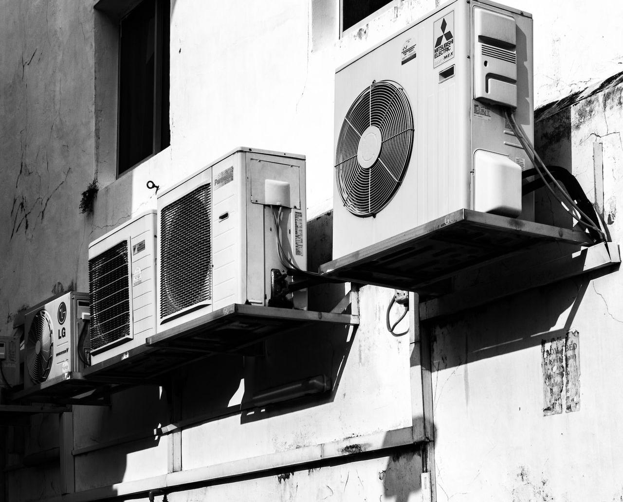 greyscale photography of AC units